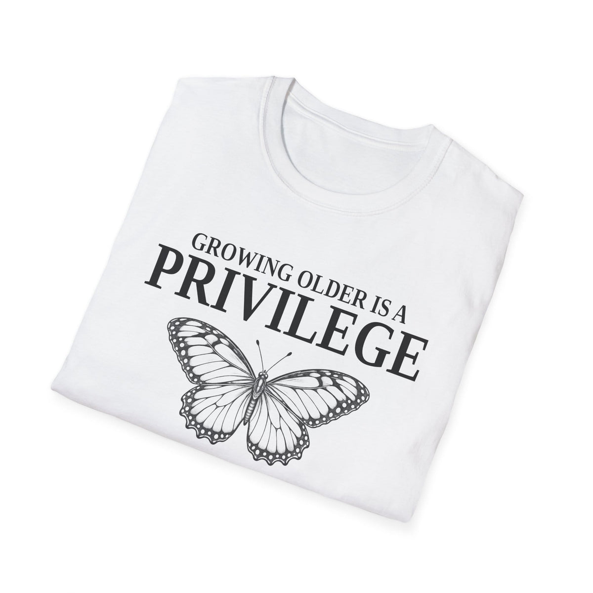 Folded white t-shirt printed with "GROWING OLDER IS A PRIVILEGE, GROWING STRONGER IS A CHOICE" in black, with a line-drawn butterfly