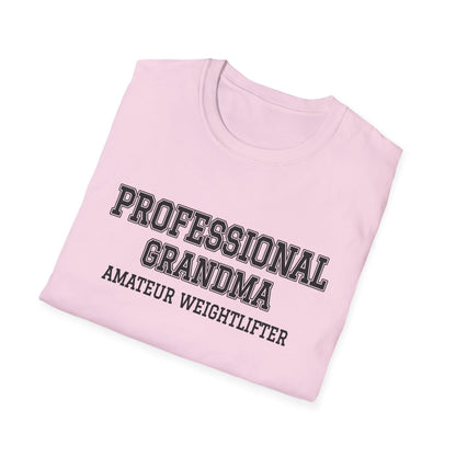 Folded light pink t-shirt printed with "PROFESSIONAL GRANDMA, AMATEUR WEIGHTLIFTER" in charcoal varsity letters
