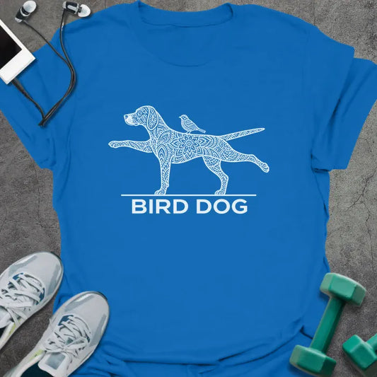 Royal blue t-shirt printed with "BIRD DOG" in white, with a patterned dog in the bird dog exercise pose and a small bird on its back