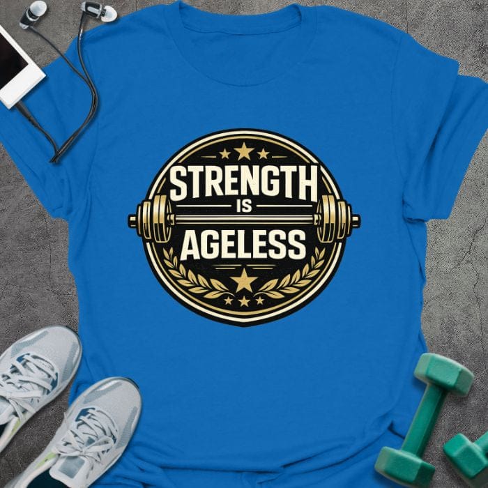 Royal blue t-shirt printed with "Strength is Ageless" in gold and white, with a circular barbell badge and stars