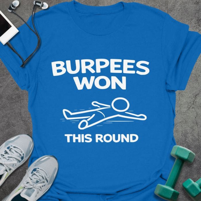 Royal blue t-shirt printed with "Burpees Won This Round" in white, with an illustration of a stick figure on the ground