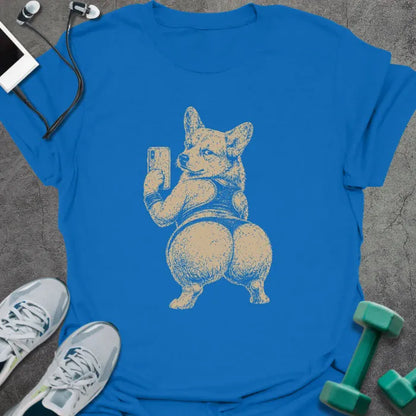Royal blue t-shirt with an illustration of a Corgi taking a selfie in white