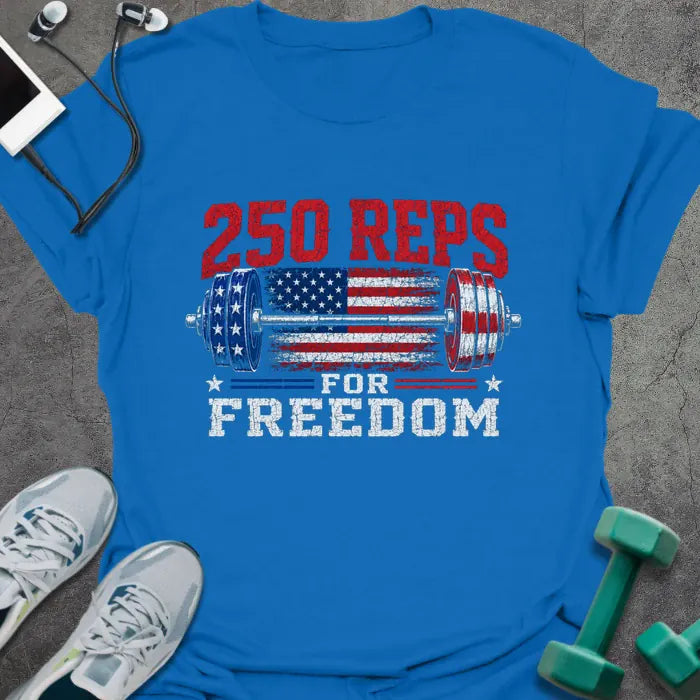 Royal blue t-shirt printed with "250 Reps for Freedom" in red and white, with a stars-and-stripes barbell