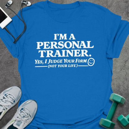 Royal blue t-shirt printed with "I'm a Personal Trainer. Yes, I Judge Your Form (not Your Life)"