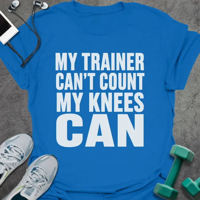 Royal blue t-shirt printed with "My Trainer Can't Count my Knees Can" in white