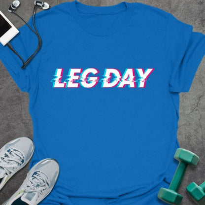 Royal blue t-shirt printed with "Leg Day" in pink and blue glitch effect
