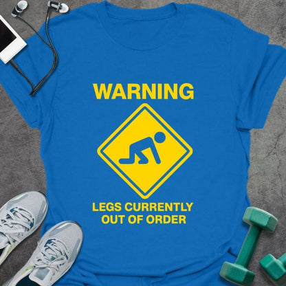 Royal blue t-shirt printed with "Warning Legs Currently Out of Order" in yellow, with a yellow warning sign of a figure crawling