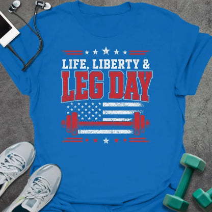 Royal blue t-shirt printed with "Life. Liberty & Legday" in white and red, with stars, a stars-and-stripes flag, and a barbell