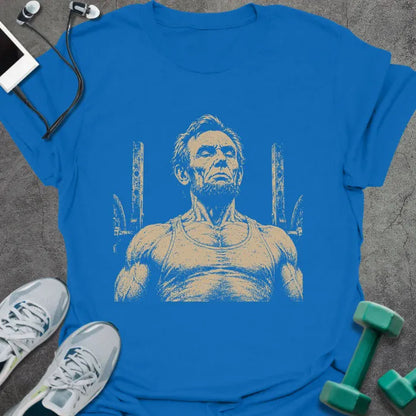 Royal blue t-shirt with a portrait of Abraham Lincoln flexing with both arms in white