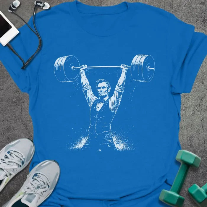 Royal blue t-shirt with Abraham Lincoln lifting barbell graphic in white