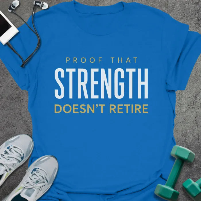 Royal blue t-shirt printed with "Proof That Strength Doesn't Retire" in white and gold