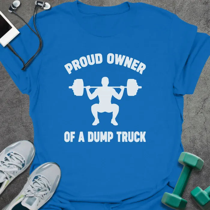 Royal blue t-shirt printed with "Proud Owner of a Dump Truck", with an illustration of a figure squatting with barbell