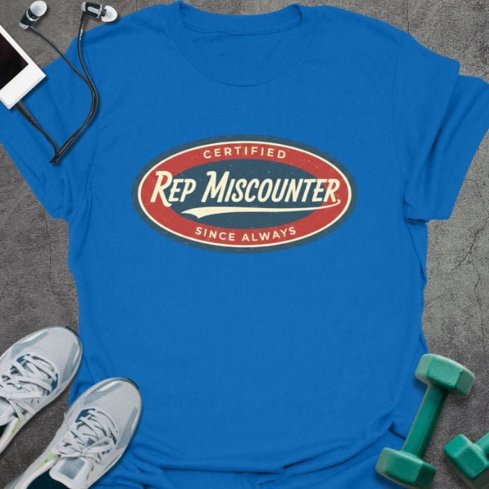 Royal blue t-shirt printed with "CERTIFIED Rep Miscounter SINCE ALWAYS" in red and blue