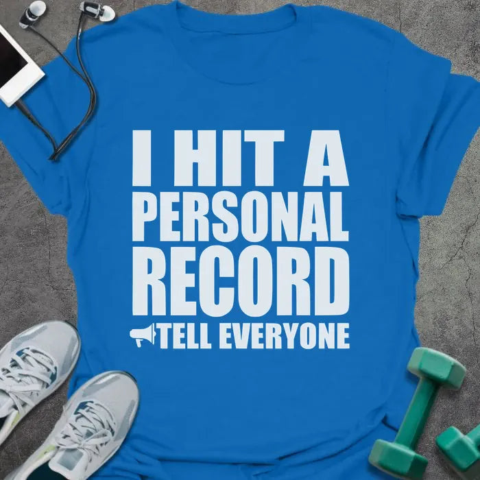 Royal blue t-shirt printed with "I Hit a Personal Record Tell Everyone" in white, with megaphone graphic