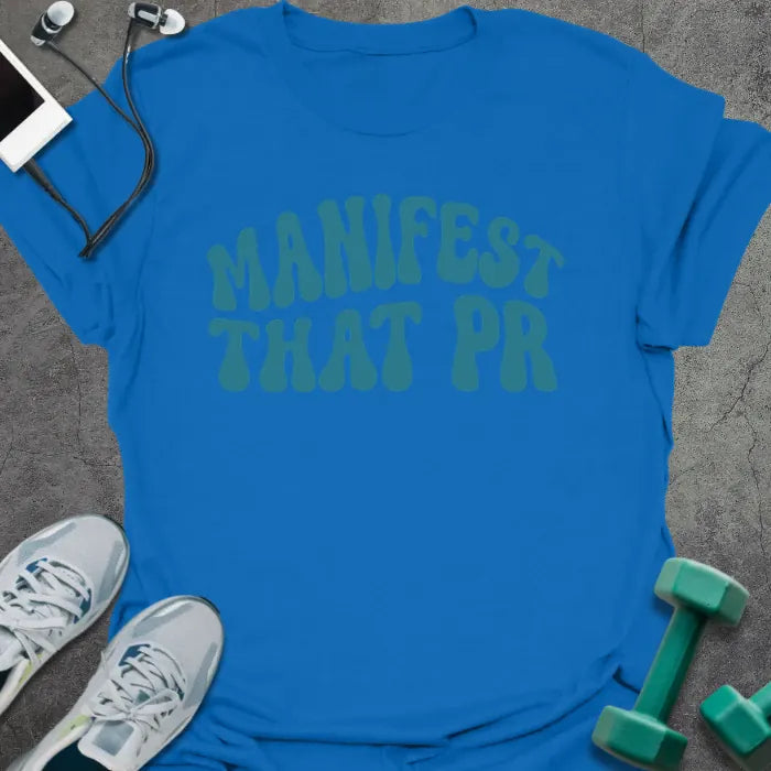 Royal blue t-shirt printed with "Manifest That PR" in teal