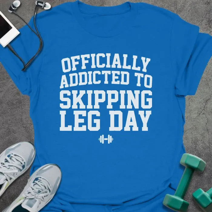 Royal blue t-shirt printed with "Officially Addicted to Skipping Leg Day" in white