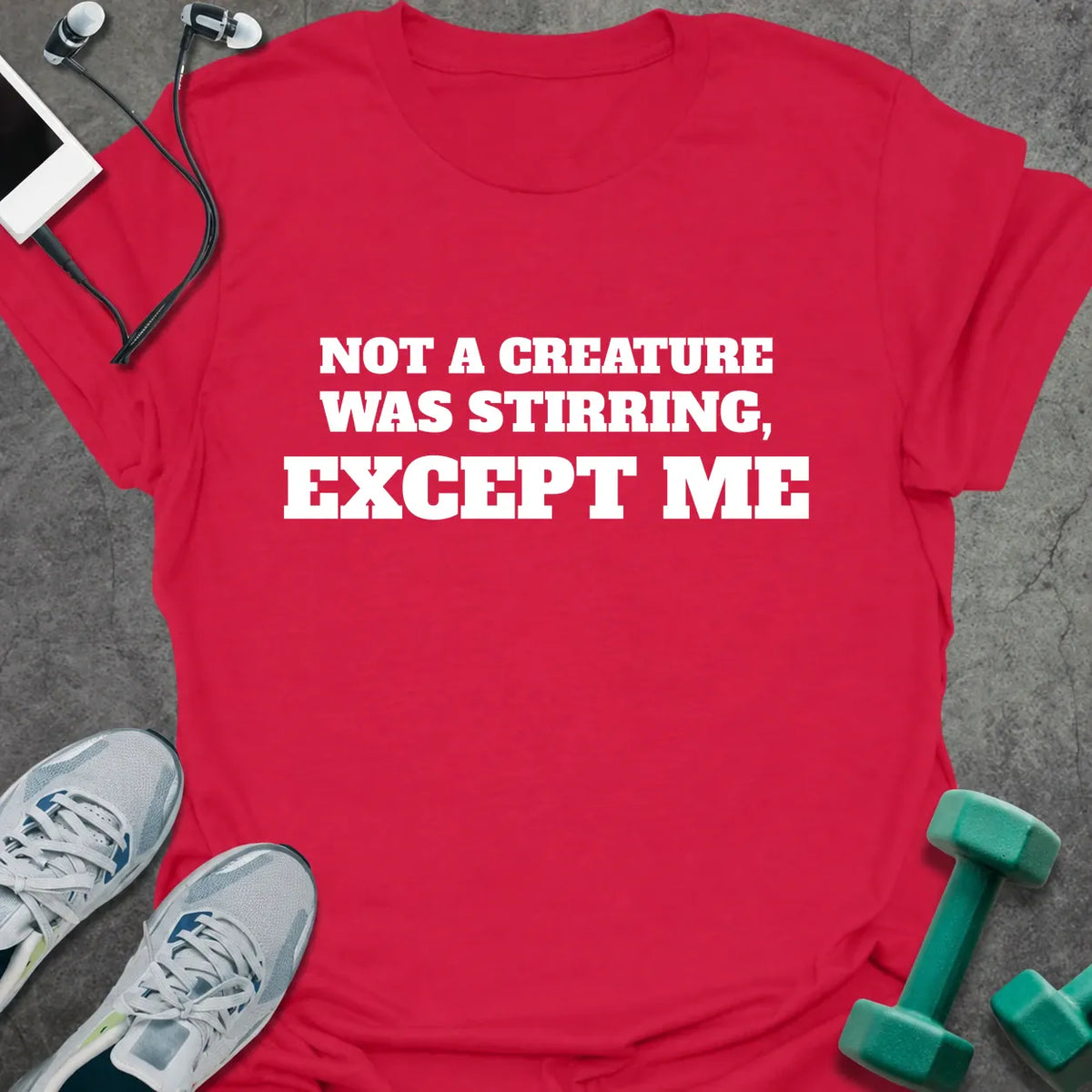Cherry red t-shirt printed with "NOT A CREATURE WAS STIRRING, EXCEPT ME" in white