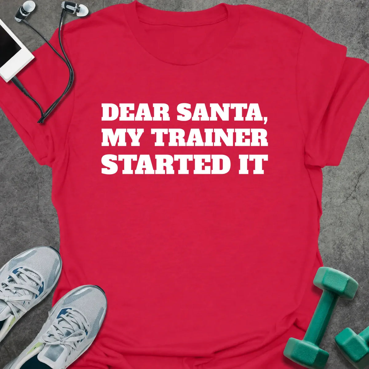 Cherry red t-shirt printed with "DEAR SANTA, MY TRAINER STARTED IT" in white