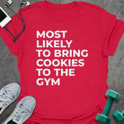 Cherry red t-shirt printed with "MOST LIKELY TO BRING COOKIES TO THE GYM" in white
