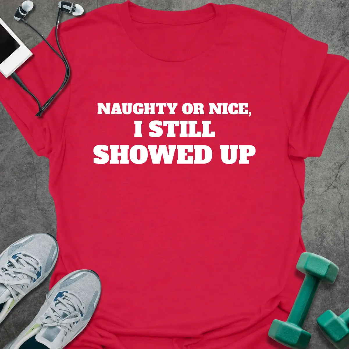 Cherry red t-shirt printed with "NAUGHTY OR NICE, I STILL SHOWED UP" in white