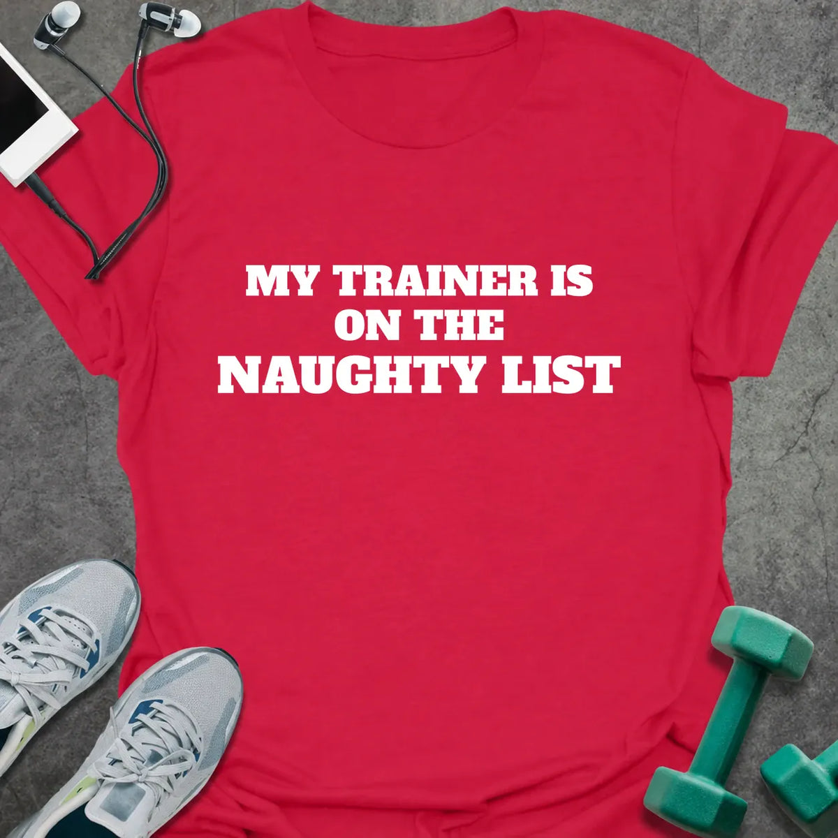 Cherry red t-shirt printed with "MY TRAINER IS ON THE NAUGHTY LIST" in white