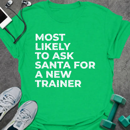 Irish green t-shirt printed with "MOST LIKELY TO ASK SANTA FOR A NEW TRAINER" in white