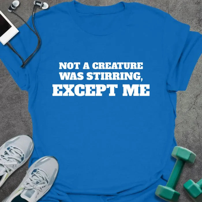 Royal blue t-shirt printed with "NOT A CREATURE WAS STIRRING, EXCEPT ME" in white