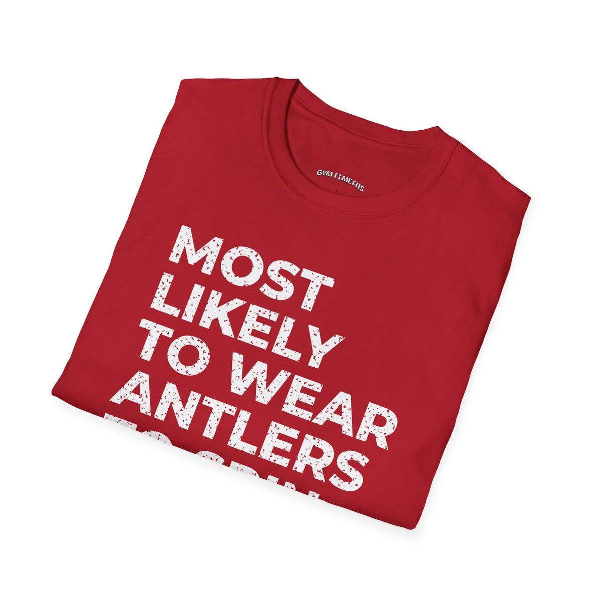Folded cherry red t-shirt printed with "MOST LIKELY TO WEAR ANTLERS TO SPIN CLASS" in white