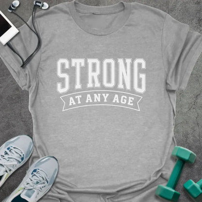 Sport grey t-shirt printed with "Strong at Any Age" in white, with a decorative banner