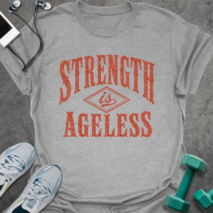 Sport Grey t-shirt printed with "STRENGTH is AGELESS" in rust/terracotta weathered vintage lettering with diamond graphic