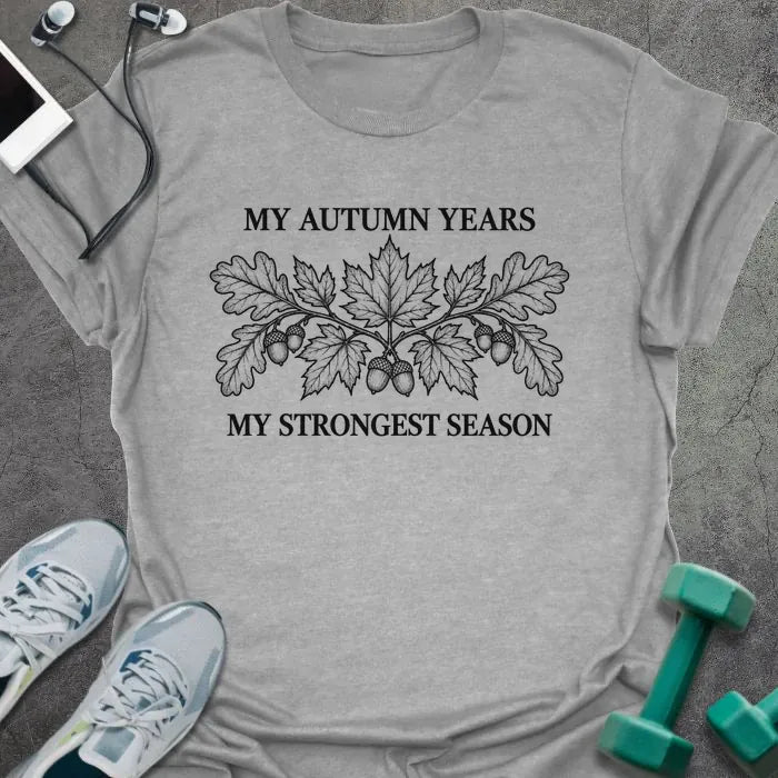 Sport grey t-shirt printed with "MY AUTUMN YEARS, MY STRONGEST SEASON" in black, with oak leaves and acorns