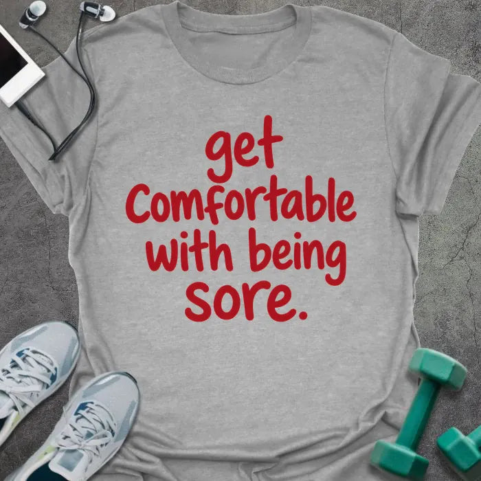 Sport grey t-shirt printed with "get comfortable with being sore." in red