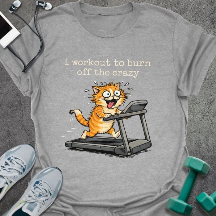 Sport grey t-shirt printed with "i workout to burn off the crazy" in white and orange, with an illustration of a crazy orange cat on a treadmill