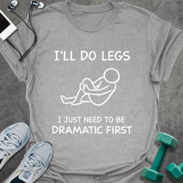 Sport grey t-shirt printed with "I'll Do Legs I Just Need to Be Dramatic First", with stick figure illustration