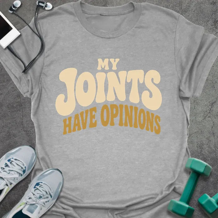 Sport grey t-shirt printed with "My Joints Have Opinions" in tan and gold