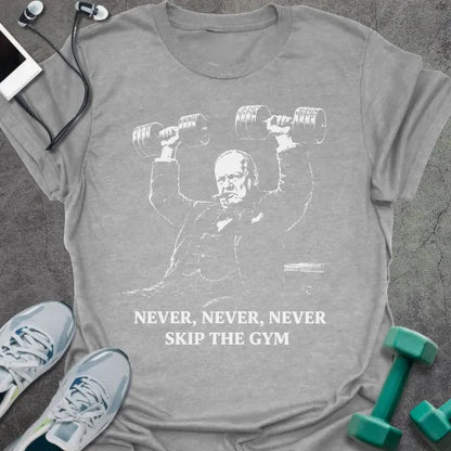 Sport grey t-shirt printed with "Never, Never, Never Skip the Gym" in white, with figure holding dumbbells overhead graphic