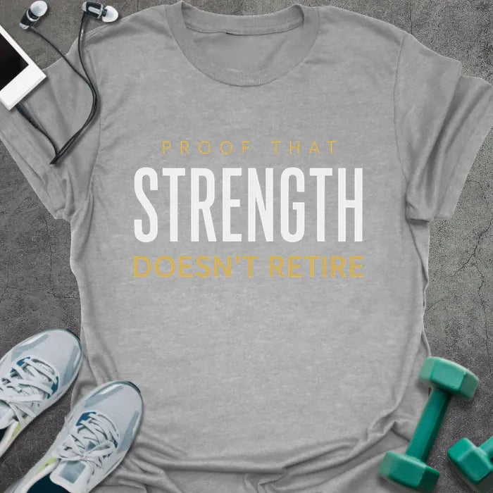 Sport grey t-shirt printed with "Proof That Strength Doesn't Retire" in white and gold