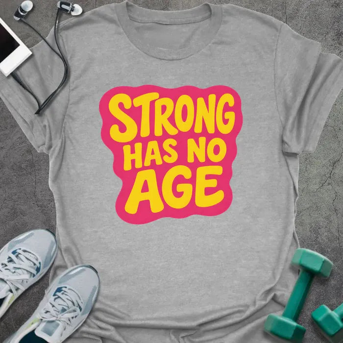 Sport grey t-shirt printed with "STRONG HAS NO AGE" in yellow and pink, with badge graphic