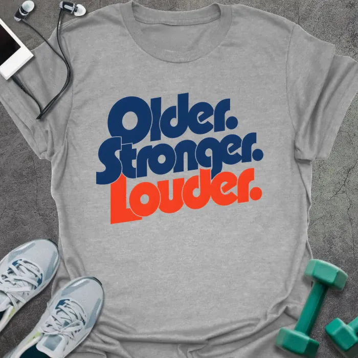 Sport Grey t-shirt printed with "Older. Stronger. Louder." in navy blue with orange bold lettering