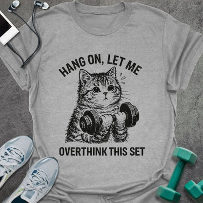 Sport grey t-shirt printed with "Hang on, Let Me Overthink This Set", with a cat holding dumbbells