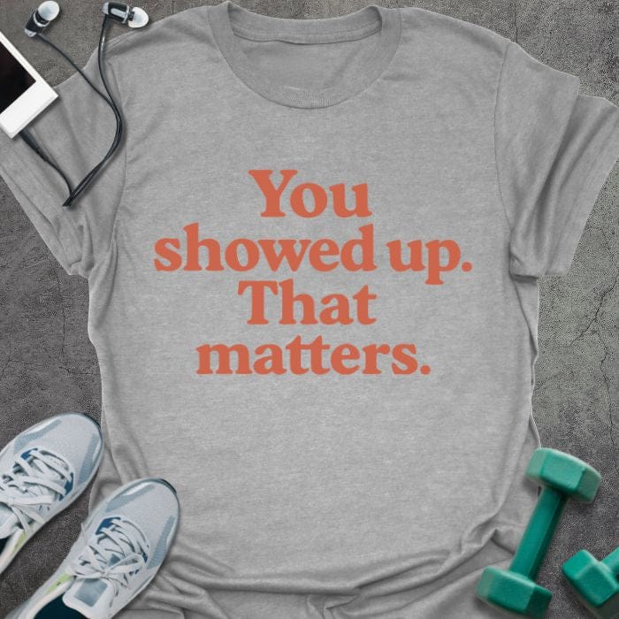 Sport grey t-shirt printed with "You showed up. That matters." in red