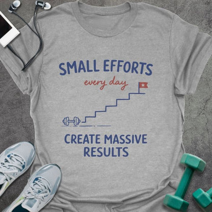 Sport grey t-shirt printed with "SMALL EFFORTS every day CREATE MASSIVE RESULTS" in red and blue, with stairs and flag illustration
