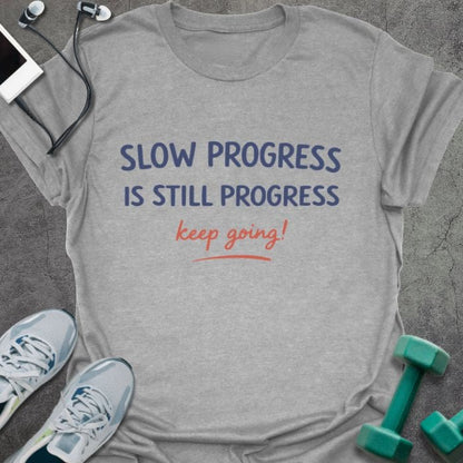 Sport grey t-shirt printed with "SLOW PROGRESS IS STILL PROGRESS keep going!" in red