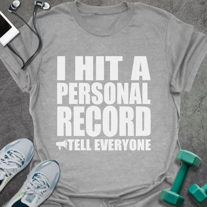 Sport grey t-shirt printed with "I Hit a Personal Record Tell Everyone" in white, with megaphone graphic