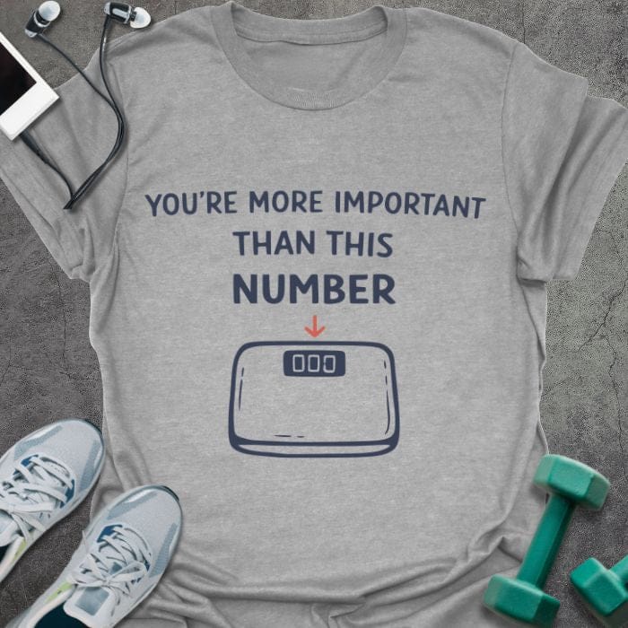 Sport grey t-shirt printed with "You're More Important Than This Number", with scale illustration