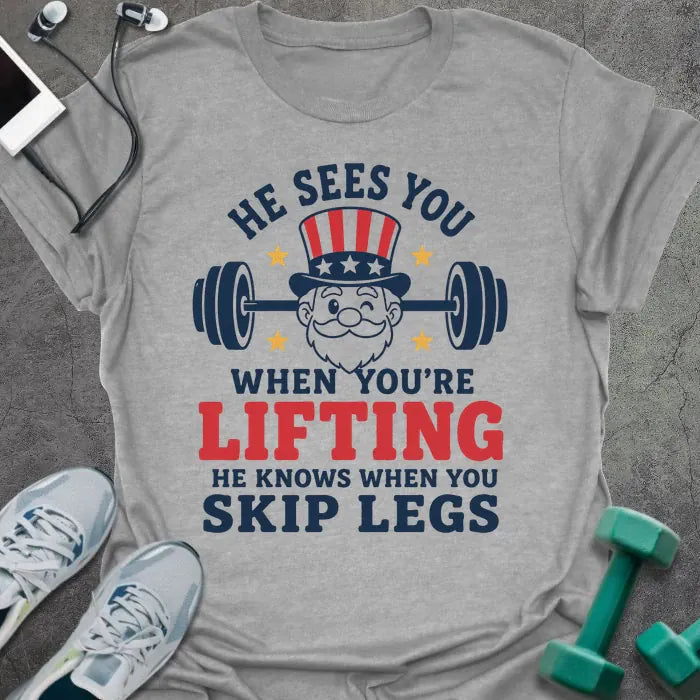 Sport grey t-shirt with an American flag person lifting dumbbells graphic in white and red