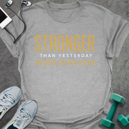 Sport grey t-shirt printed with "Stronger Than Yesterday Wiser Than Ever" in white and gold