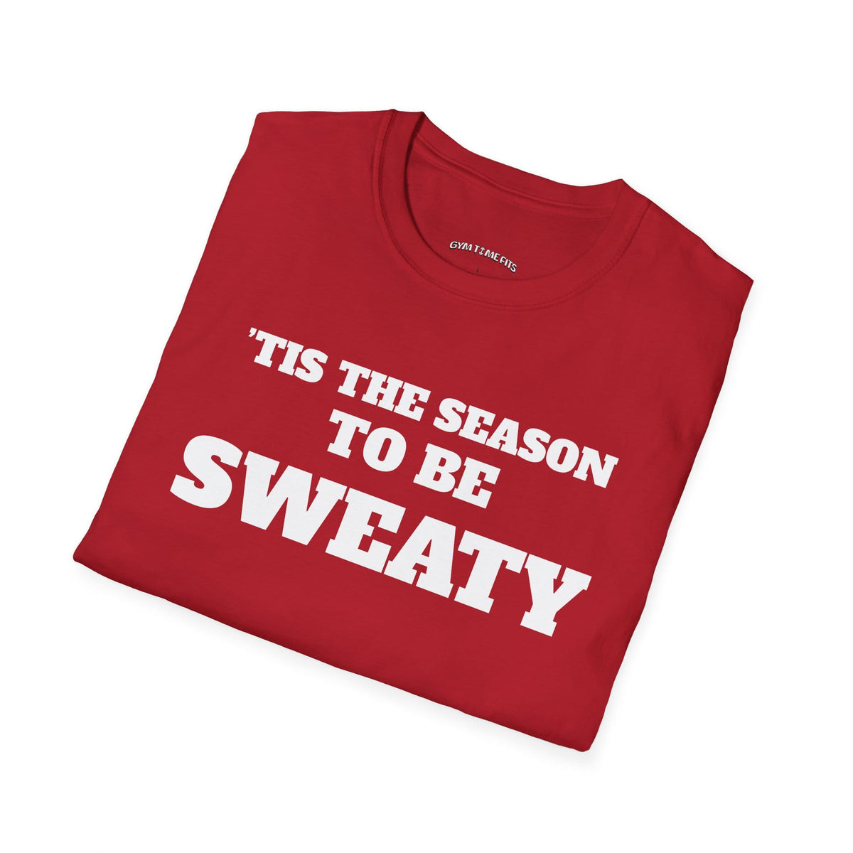Folded cherry red t-shirt printed with "'TIS THE SEASON TO BE SWEATY" in white