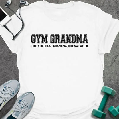 White t-shirt printed with "GYM GRANDMA, LIKE A REGULAR GRANDMA, BUT SWEATIER" in black