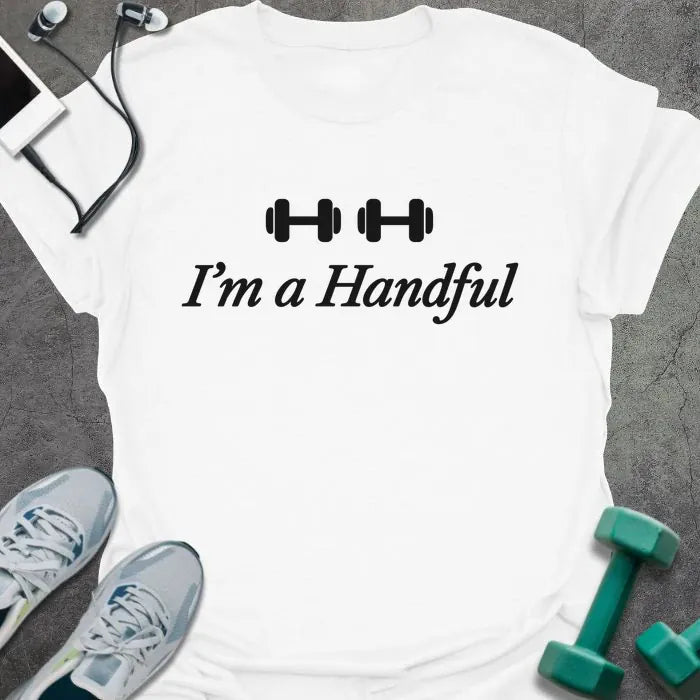 White t-shirt printed with "I'm a Handful" in black, with two dumbbell icons
